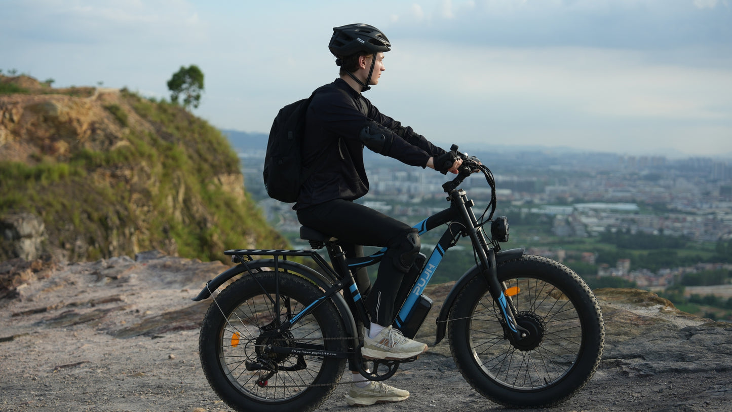 PUJH PU2-52V25AH- Full Suspension Fat Tire E-bike, 55 mph top speed, 100 mile range, 3000 Wh, 38 kg, 26 in - Black.