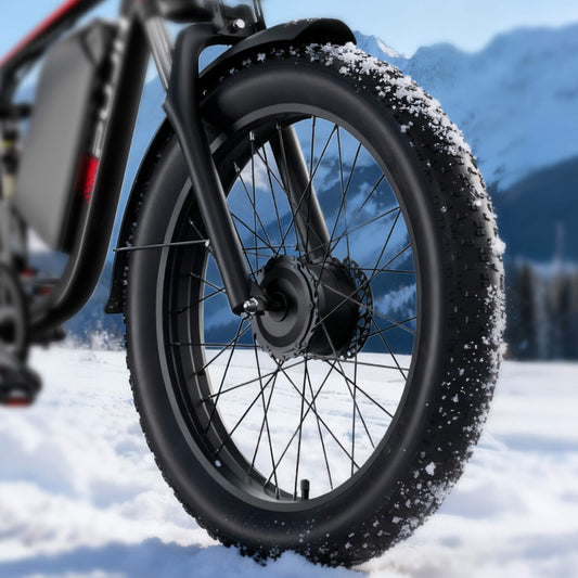 Close-up of electric bicycle snowdrift tires on the snow
