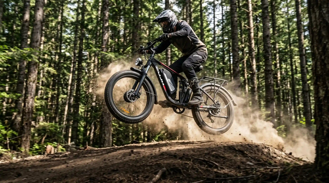 PUJH PU366 all-terrain electric bike with 6000W dual brushless motors catching air on a forest dirt jump