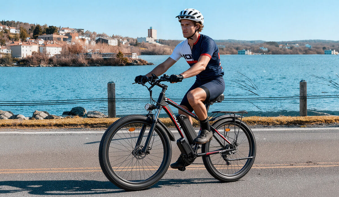 A man was riding a city electric bicycle along the river.