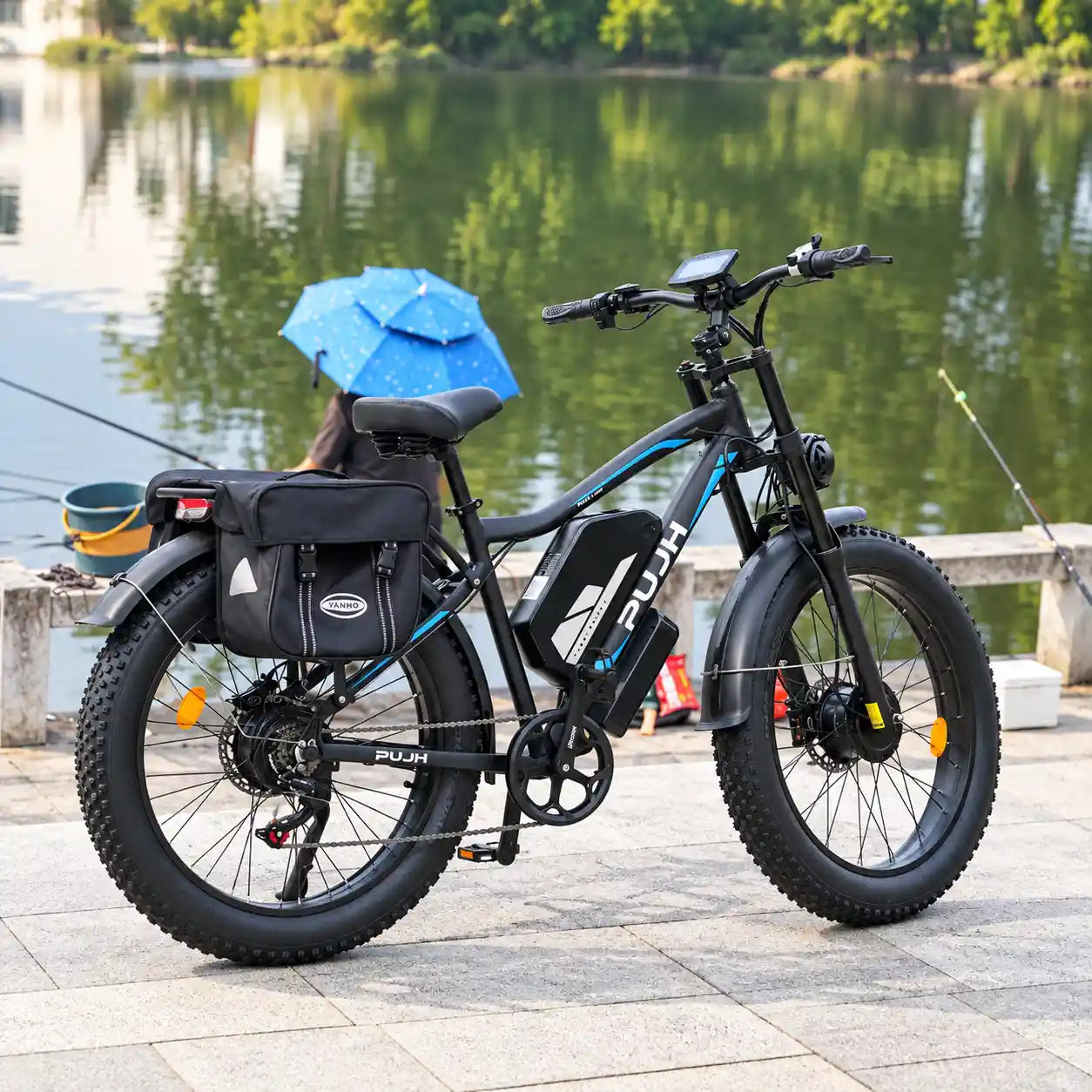 PUJH PU266 fat tire electric bike in a lakeside fishing scene with rear pannier bag