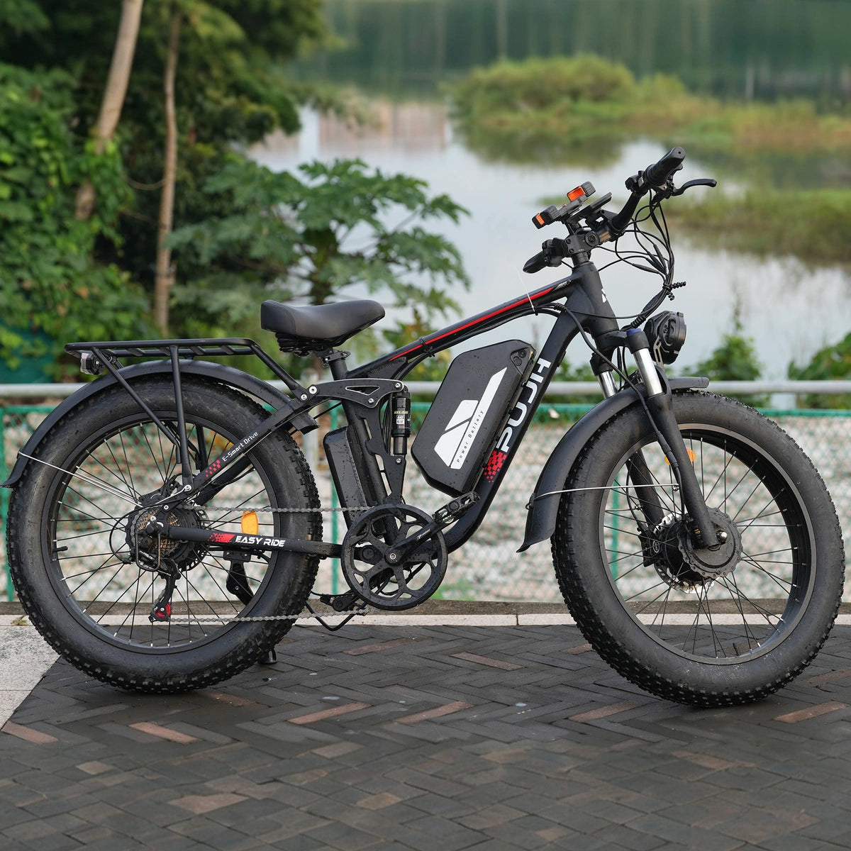 Side view of the PUJH PU366 dual motor fat tire ebike with 6000W peak power, 60V 20Ah battery, full suspension, and hydraulic disc brakes