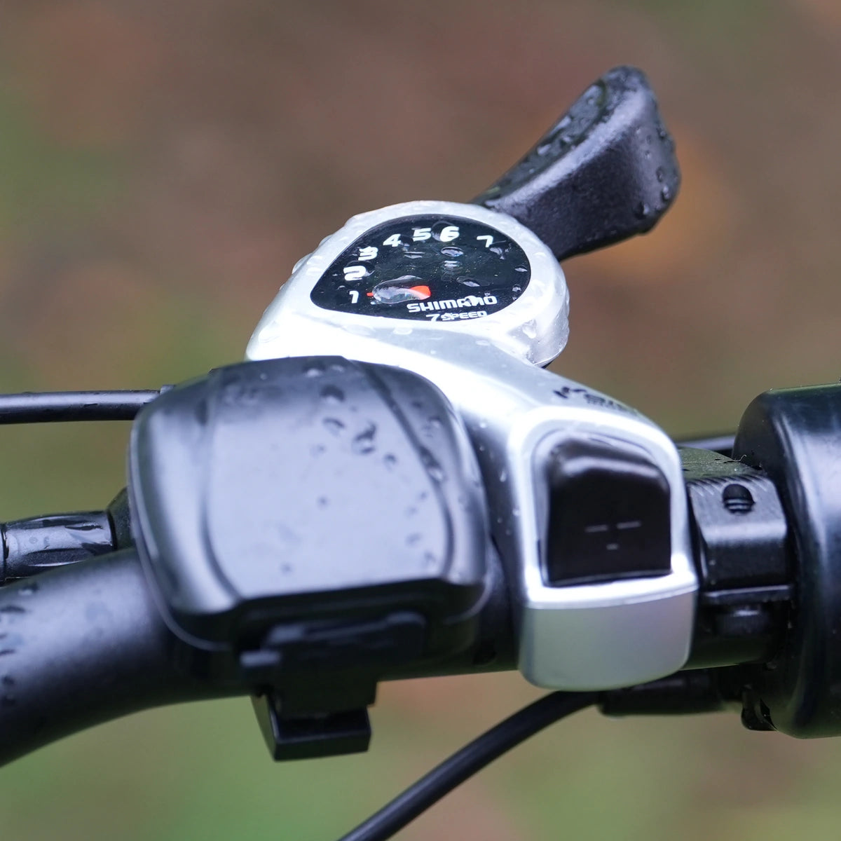 Close-up of the Shimano 7-speed shifter on the PUJH PU366 dual motor fat tire electric bike